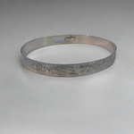 Gilbert Pat 5/16 Silver Bangle 2 Wolves and sun -  - carved jewelry - House of Himwitsa Art Gallery