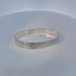 Gilbert Pat 5/16 Silver Bangle 2 Wolves and sun -  - carved jewelry - House of Himwitsa Art Gallery